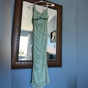 Sage green midi length wedding guest dress